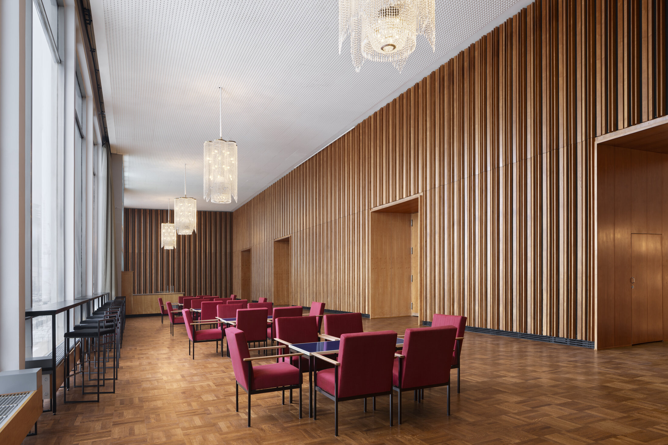 The Panorama Bar of Kino International with Bohemian crystal chandeliers and a window onto Karl-Marx-Allee